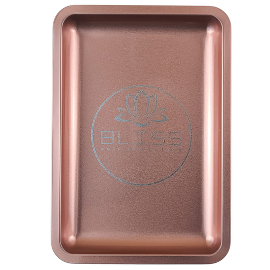 Bliss vous propose son plateau rectangulaire de couleur rose cuivrée