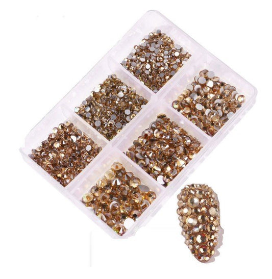 Bliss vous propose sa boite de strass champagne pour vos poses nail art 